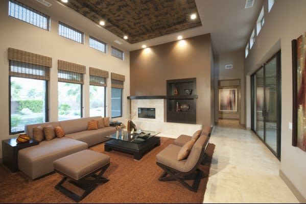 Automated Window Treatments in the living room of luxury home