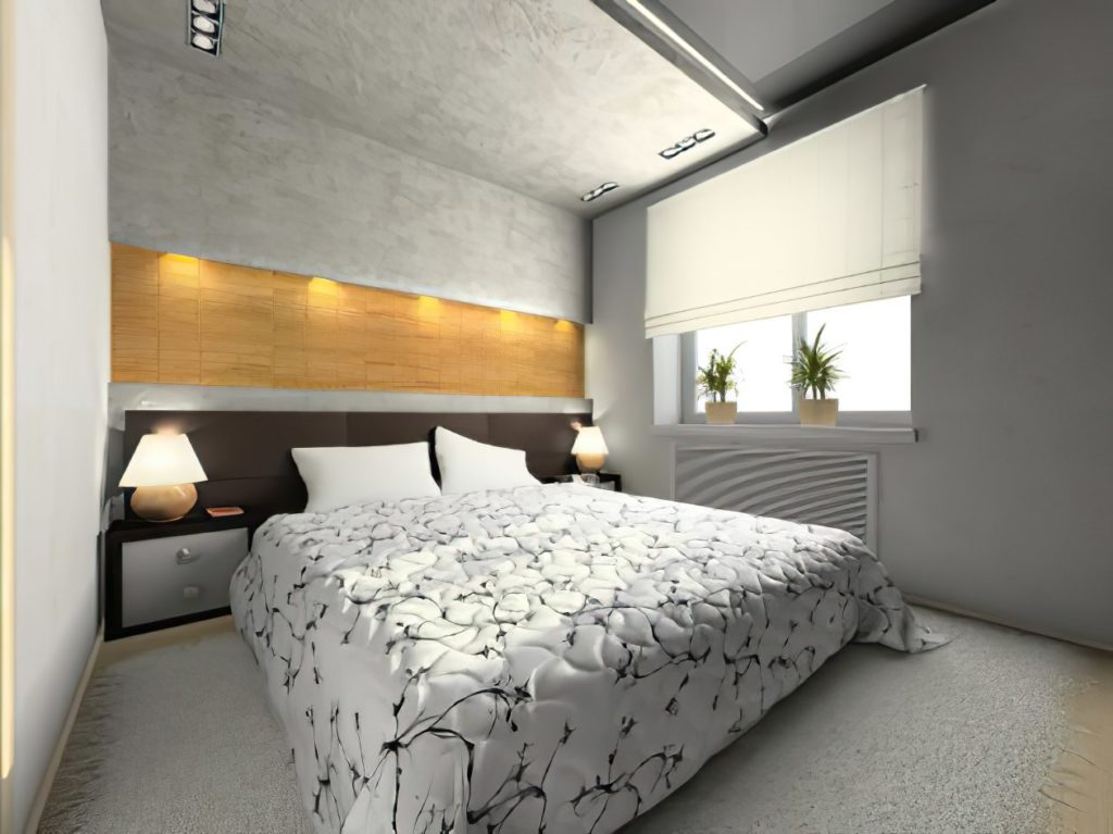 A modern bedroom equipped with automated blinds installed by Architectural Window Treatments blinds in a luxury apartment.